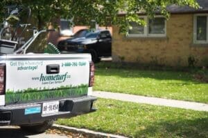 Photo of Hometurf technician's truck parked outside customer's property.