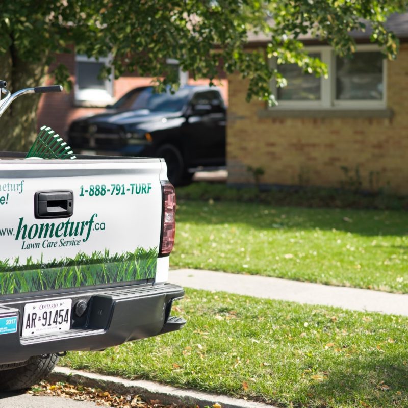 Photo of Hometurf technician's truck parked outside customer's property.