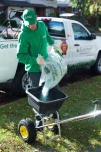 Hometurf technician using fertilizer